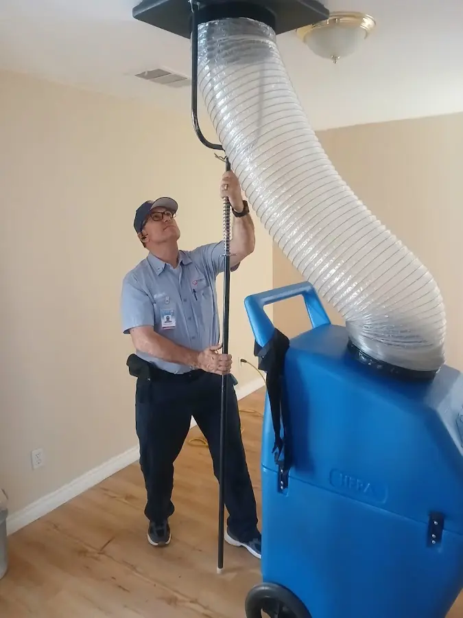HVAC Installation technician using HEPA equipment in South Houston